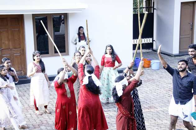 Edstem Technologies team members enjoying traditional Uri Adi balloon games during company Onam festival
