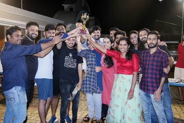 Edstem Technologies first place winners receiving trophy and recognition at Onam celebration award ceremony